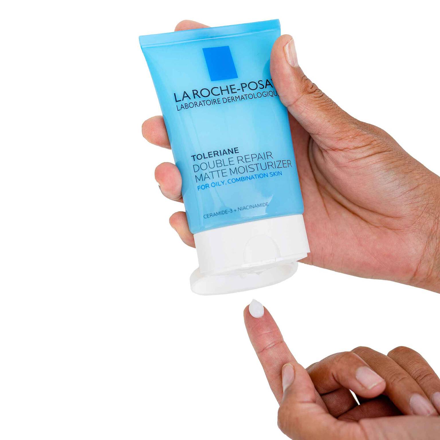 toleriane-double-repair-matte-face-moisturizer-for-oily-skin-d7 la-roche-posay-toleriane-matte-lotion-on-finger.jpg